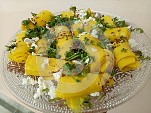 Khandvi -Gluten free Indian Gujarati snack made of chickpea flour, selective focus