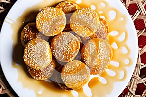 Khanfaroosh or Types of cheese cookie and biscuit served in dish isolated on red mat top view on table arabic food