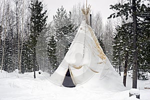 Khanty national tent in the winter forest