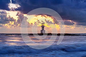 Khao Lak lighthouse at sunset, Thailand. photo