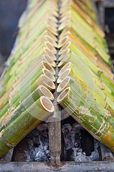 Khao Larm :: sticky rice grilled in bamboo tube photo