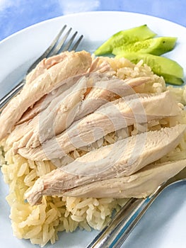 Khao Man Kai or Kao Man Gai, Hainanese chicken rice, steamed chicken and white rice