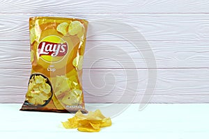 KHARKOV, UKRAINE - JANUARY 3, 2021: Lays potato chips with cheese flavour and original lays logo in middle of package. Worldwide