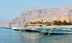 Khasab city creek and desert rock scenery in Oman