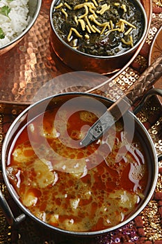 Khatta Alu is a potato curry from Gujarat photo