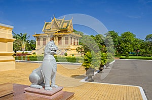 Khemarin Palace and a lion statue at the Royal Palace in Phnom P