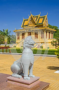 Khemarin Palace and a lion statue at the Royal Palace in Phnom P