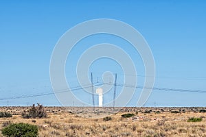 Khi Solar power tower and guyed cross-rope suspension pylon