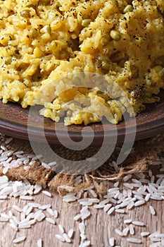 Khichdi on a plate close-up. vertical.