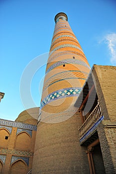 Khiva: medieval minaret on sunset