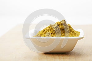 Khmeli suneli spice mixture on wood