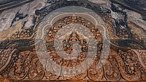 Khmer architecture carved red stone in Banteay Srei temple .Banteay Srei is one of the most popular ancient temples in Siem Reap,