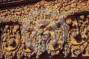 Khmer art at Banteay Srei or Banteay Srey which is a 10th-century Cambodian temple.