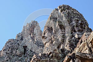 The Khmer Bayon Temple in Cambodia, with stone human faces on its towers