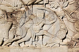 Khmer soldier killing Cham warrior carving photo