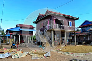 Khmer traditional wooden house, most of them is blue coloured, Klong Duan Keo, Takeo, Cambodia