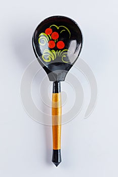 Khokhloma painting. Retro style - Russian old wooden spoon khokhloma painting on a white background