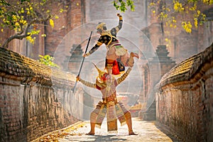Khon or traditional Thai classic masked from the Ramakien characters action of traditional dance with fighting position and Thai photo