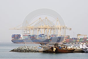 Khor Fakkan UAE Large cargo ships docked to load and unload goods at Khor Fakkport