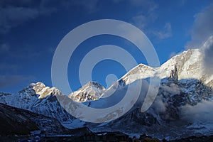 Khumbutse and Changtse mountain peaks in Himalayas at sunset