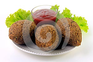 Kibbeh on the plate, traditional Lebanese cuisine food, isolated on white background