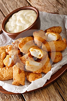 Kibbeling is typical Dutch street food, it consists of bits of fish dunked in batter that are deep fried and served with a dipping