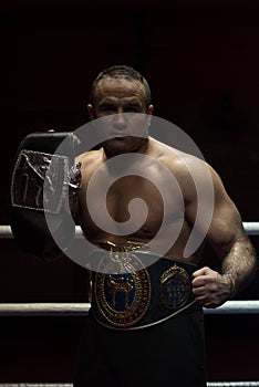 Kick boxer with his championship belt