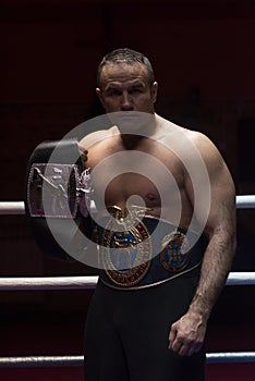 Kick boxer with his championship belt