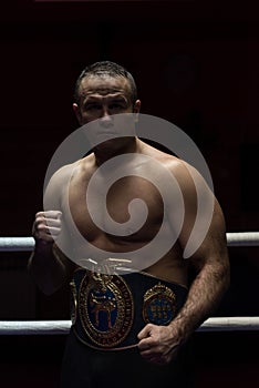 Kick boxer with his championship belt