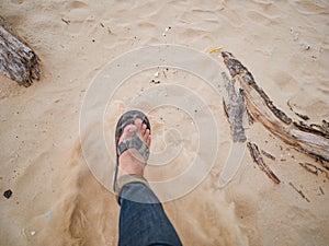 Kick the sand on the beach