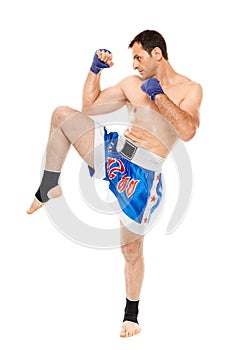 Kickbox fighter executing a kick