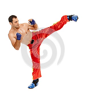 Kickbox fighter executing a kick