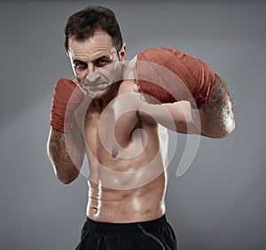 Kickbox fighter on gray background