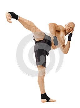 Kickboxer executing a powerful kick