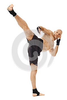 Kickboxer executing a powerful kick