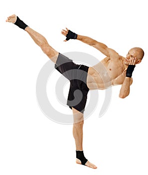 Kickboxer executing a powerful kick