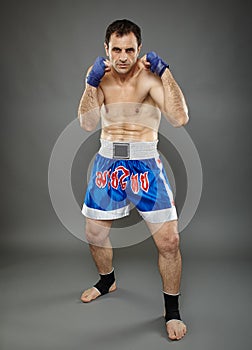 Kickboxer in guard stance