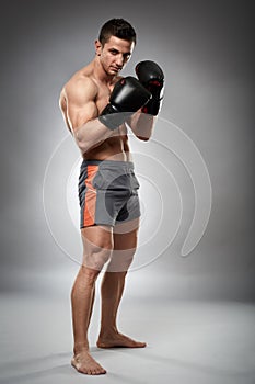 Kickboxer in guard stance