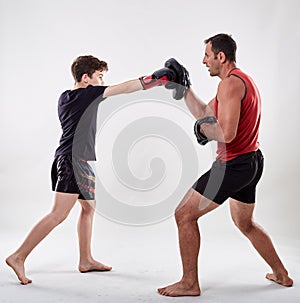 Kickboxer kid and his coach