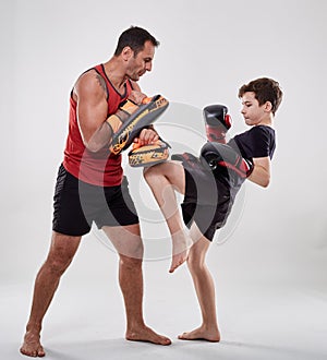 Kickboxer kid and his coach