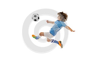 Little boy, football soccer player in action, motion training isolated on white studio background. Concept of sport