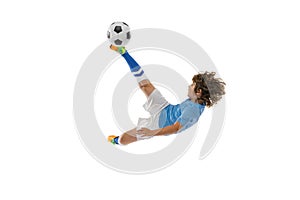 Little boy, football soccer player in action, motion training isolated on white studio background. Concept of sport