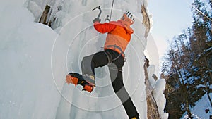 Kicking with crampons into the ice