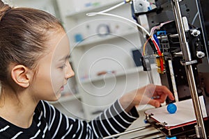 Kid with 3d printe. education, technology,