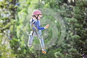 Kid in adventure park