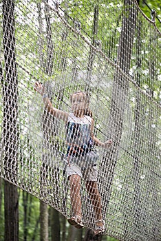 Kid in adventure park