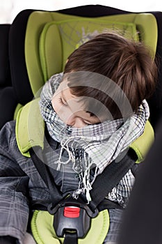 Kid asleep in the car