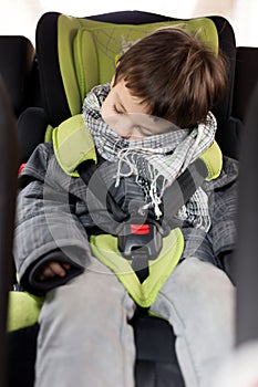 Kid asleep in the car