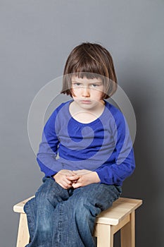 Kid attitude concept for sulking 4-year old child