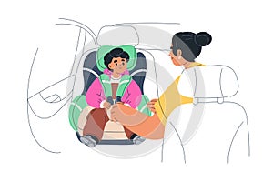 Kid in baby car seat. Mother fastening child passenger in toddlers chair at backseat. Childrens safety, security